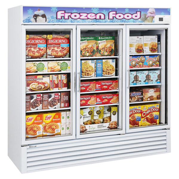A Turbo Air white glass door merchandising freezer with shelves of frozen food.
