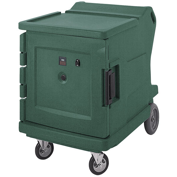 A green Cambro low profile electric food holding cabinet on wheels.