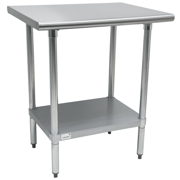 A stainless steel Advance Tabco work table with a galvanized shelf.