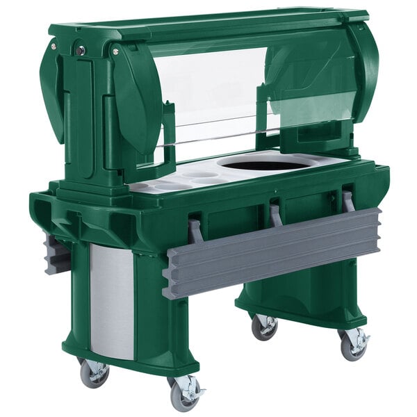 A green Cambro Versa food cart with heavy-duty casters.