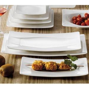 A CAC New Bone White rectangular porcelain platter with food on it.