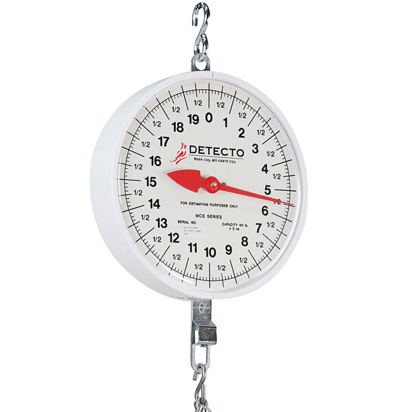 A white Cardinal Detecto hanging scale with double dial and chains.