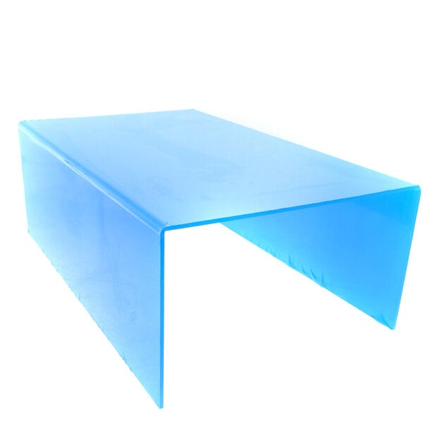 A blue plastic sneeze guard on a table.