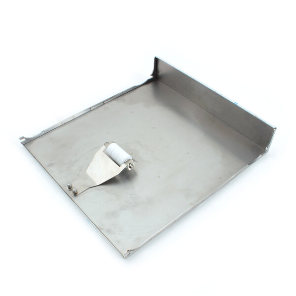 A stainless steel tray with metal screws on a metal surface.
