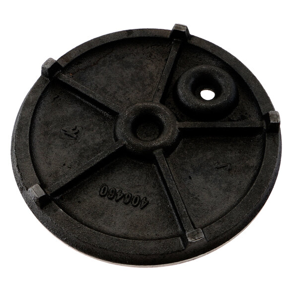 A black plastic disc with a hole in the center.
