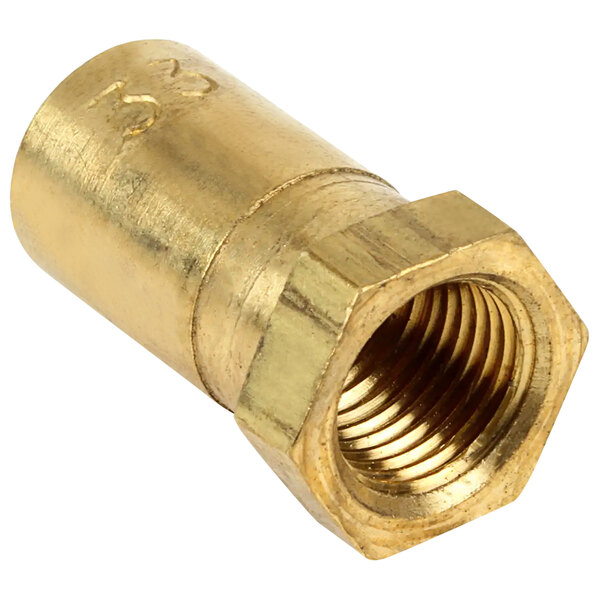A brass APW Wyott burner orifice with a gold metal nut.