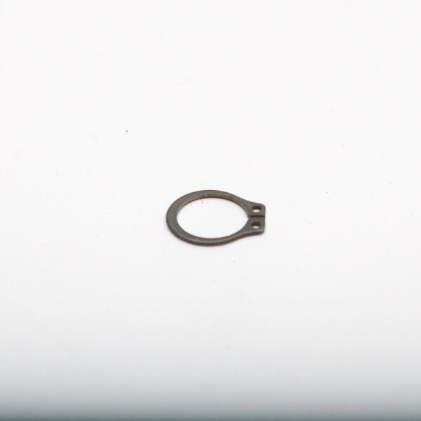 A Blakeslee metal retaining ring on a white surface.