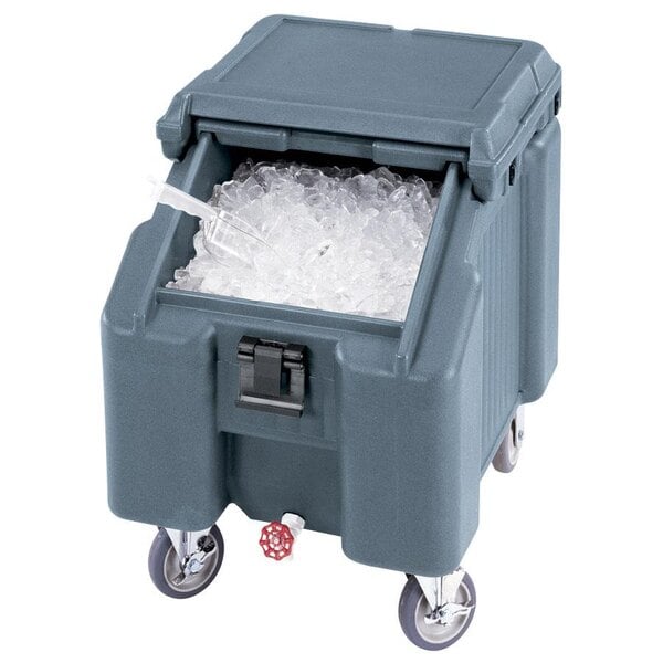 A grey Cambro mobile ice bin with ice inside.