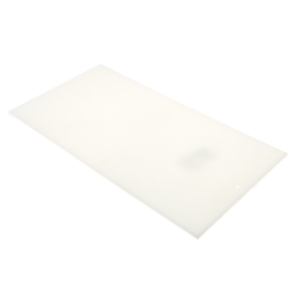 A white rectangular Kairak cutting board on a white surface.