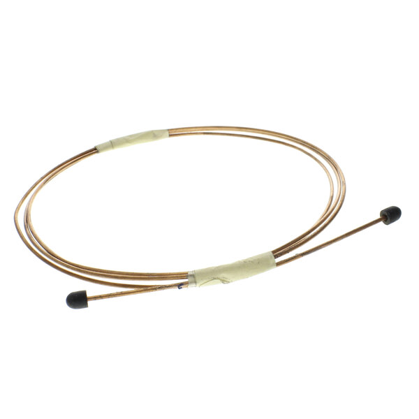 A Beverage-Air capillary tube with a gold cable and two black wires with white tape