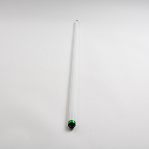 A white object with a green tip.