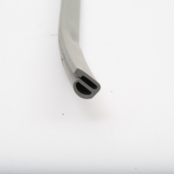 A close up of a grey plastic tube.