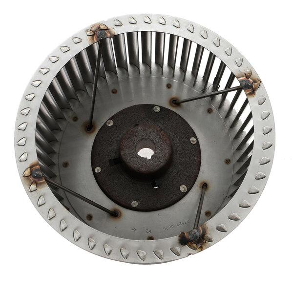 A metal Middleby Marshall blower wheel with metal blades and a metal circular cover.
