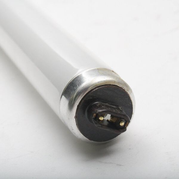 A close-up of a Master-Bilt fluorescent tube with white ends.