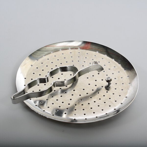 A Legion stainless steel strainer with 1/8in holes on a metal surface.
