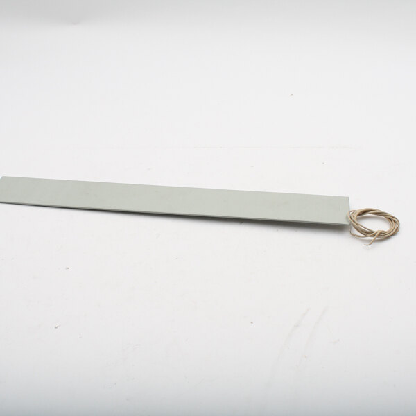 A white rectangular metal heat element with a wire.