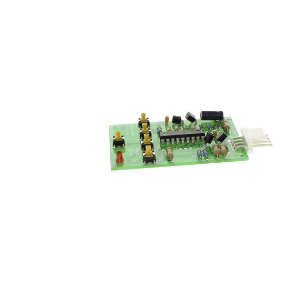 A green circuit board for a Cornelius Portion Control Board with many small components.