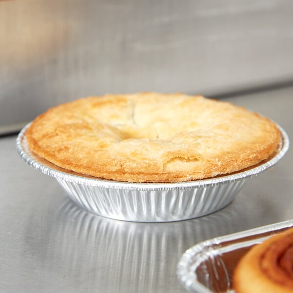 A close up of a pie in a D&W foil tart pan.