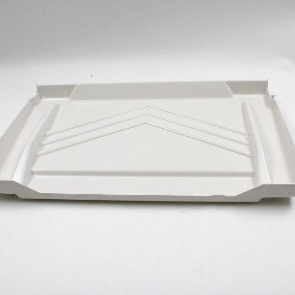 A white Manitowoc Ice water curtain tray with a triangle design.
