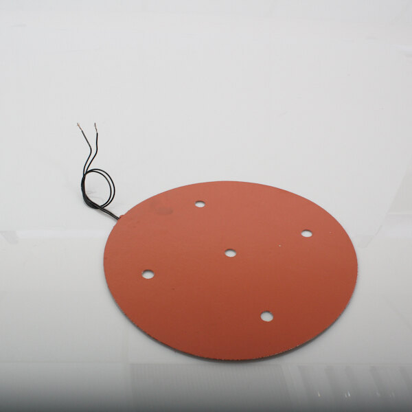 A round red heating pad with a black wire.