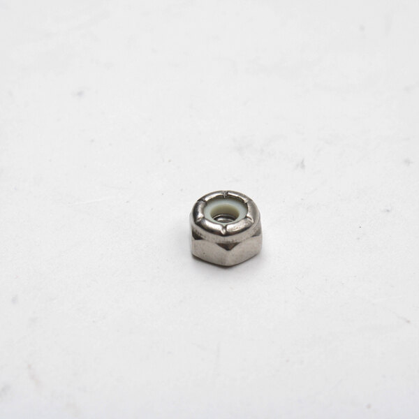 A Legion stainless steel nut on a white surface.