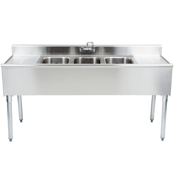 An Eagle Group stainless steel underbar sink with three sinks and two drainboards.