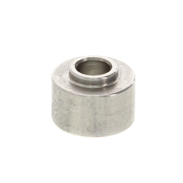 A close-up of a Southbend Swivel Spacer, a metal cylinder with a hole.