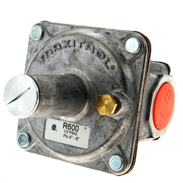 A metal Garland pressure regulator with a red button and a screw.