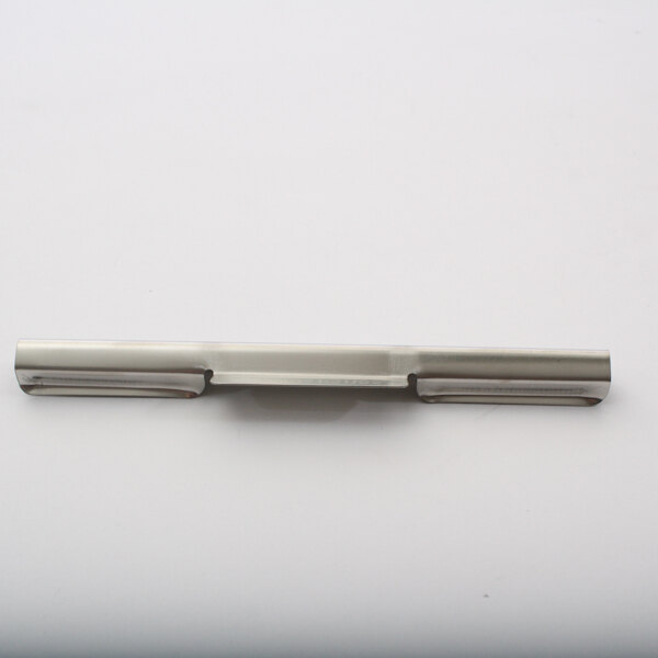 A silver metal clip with white Teflon sheet clips.