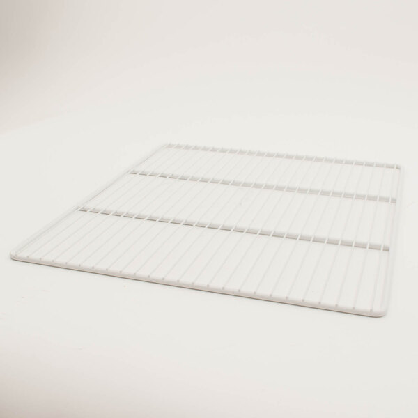 A white wire rack with a white grid on top.