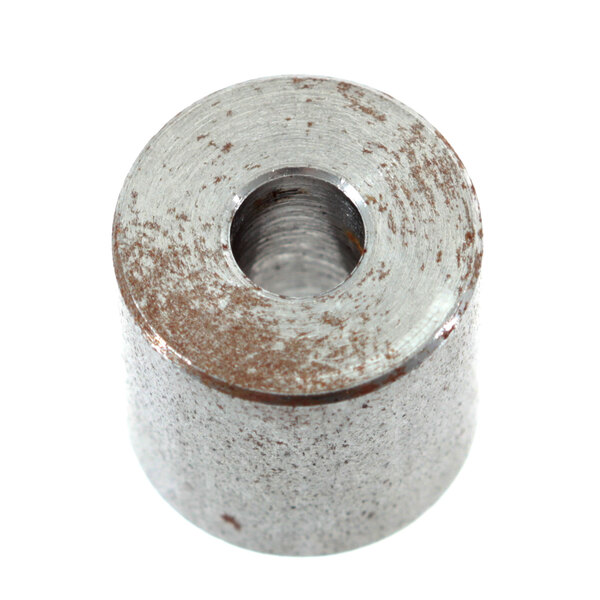 A metal cylinder with a hole.