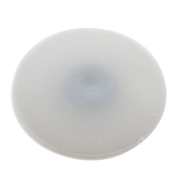 A white plastic circular screw cover with a hole in the center.