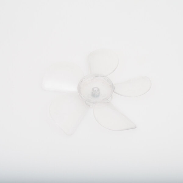 A plastic fan blade with transparent blades on a white surface.