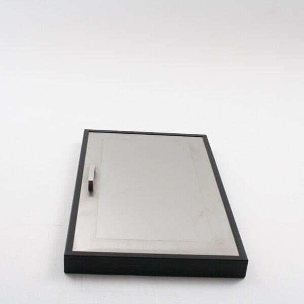 A black and silver rectangular Glastender ss door lid with a handle.