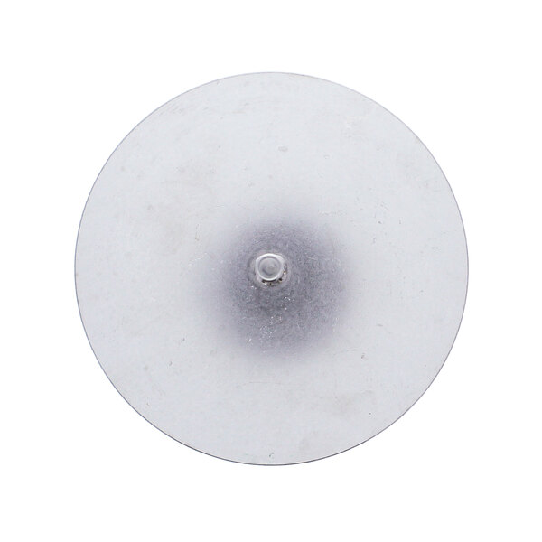 A white plastic circular disc with a hole in the center.