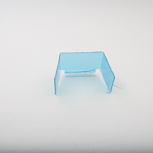 A blue rectangular plastic object with a white label.