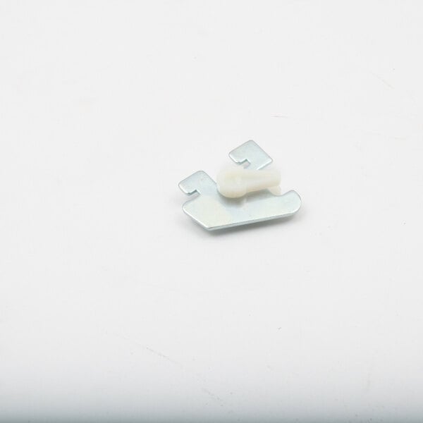 A white plastic Master-Bilt shelf clip.