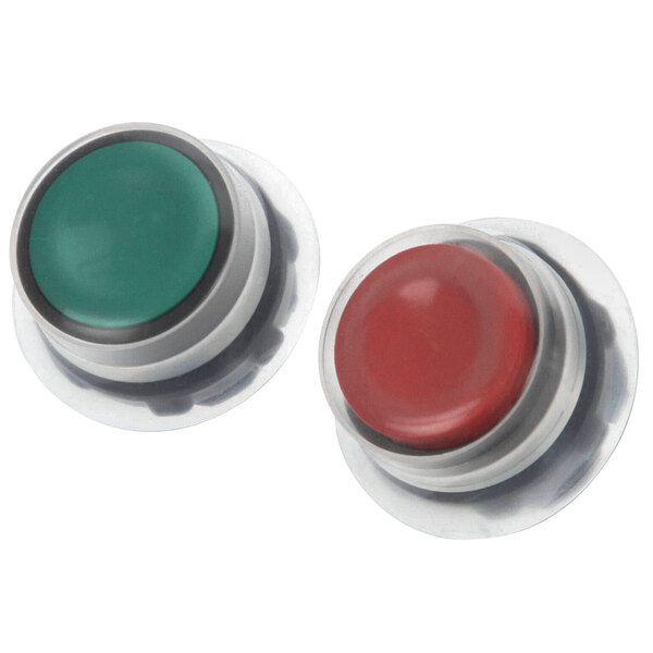 A close-up of a white Electrolux round plastic cap with a red and green button.