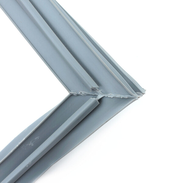A close-up of a Glastender grey plastic door gasket corner.