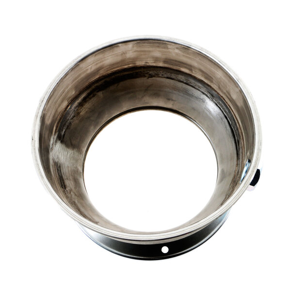 A circular metal InSinkErator body container with a hole in the middle.