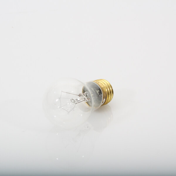 A Duke 156029 light bulb on a white surface.