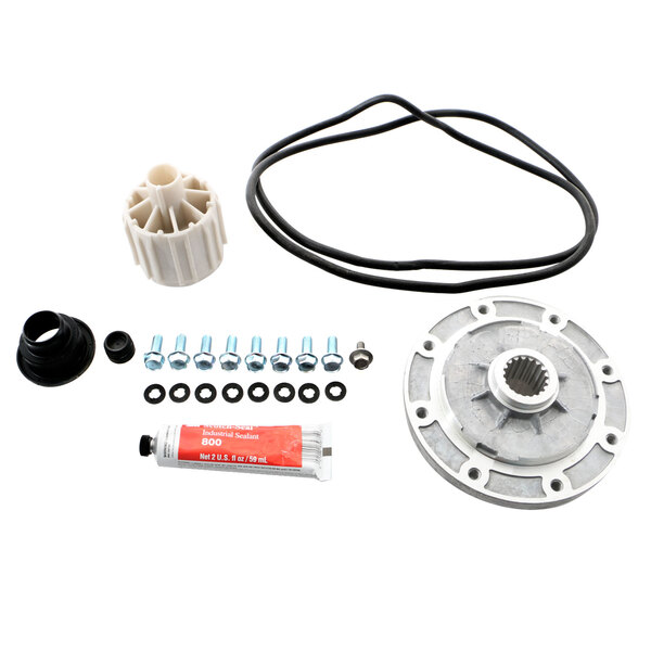 A Speed Queen hub seal kit for a laundry machine with a white plastic and metal object with holes.