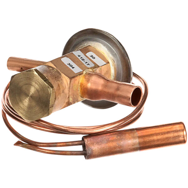 A copper Cornelius valve expansion on a copper pipe.