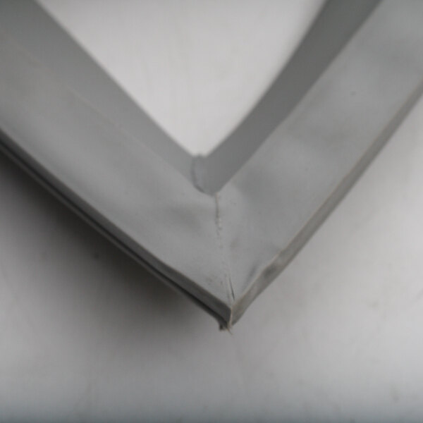 A close up of a grey rubber corner.