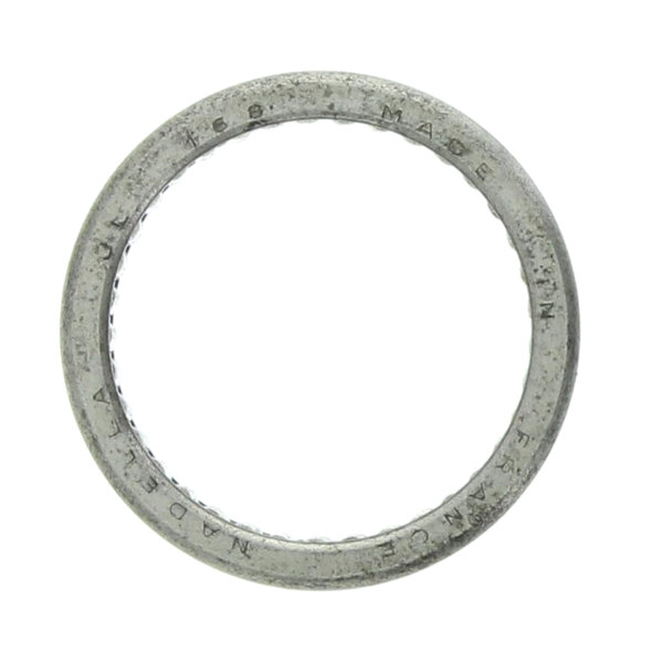 A circular metal needle bearing with writing on it.