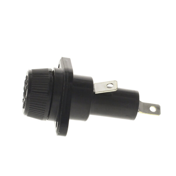 A black plastic US Range fuse holder.