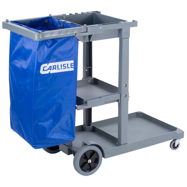 A Carlisle gray janitor cart with a blue bag on it.