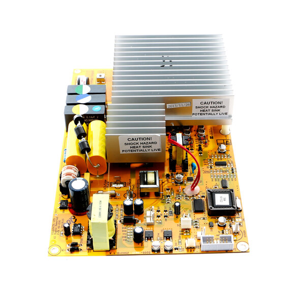 A close-up of a Vollrath power supply board with a computer chip.