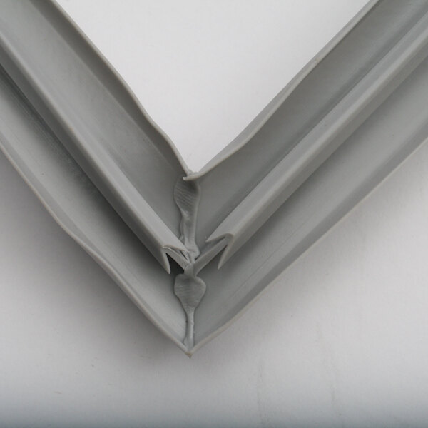 A close-up of a grey plastic corner.