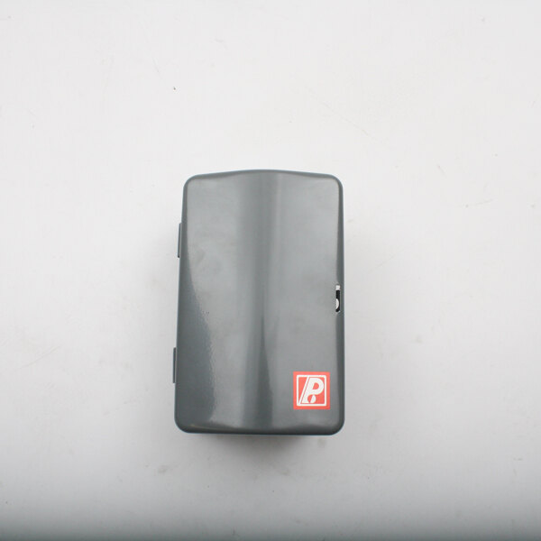 A grey rectangular object with a white logo.